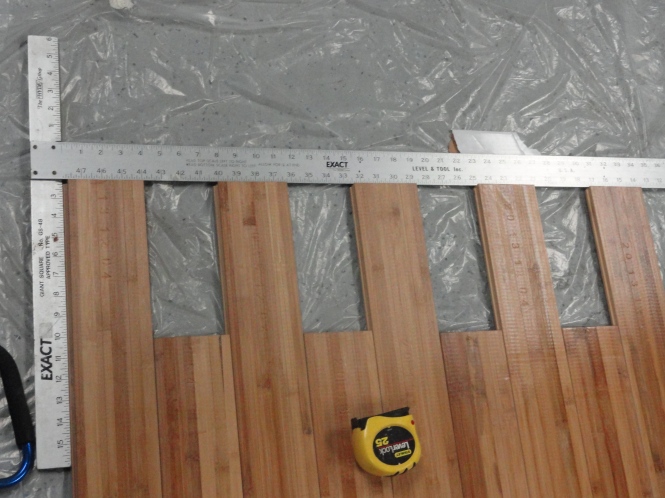 tongue and groove measuring and cutting plywood for DIY sliding barn door laminate wood flooring