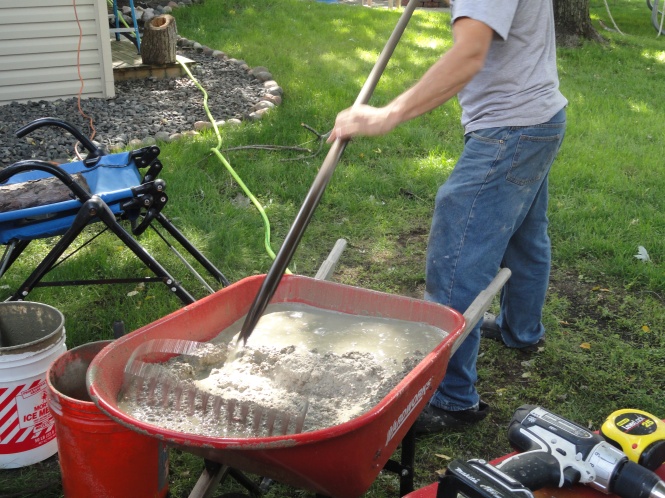 pouring and leveling concrete mixture